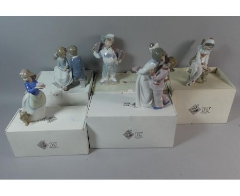 A Collection of Five Boxed Nao Figural Ornaments 