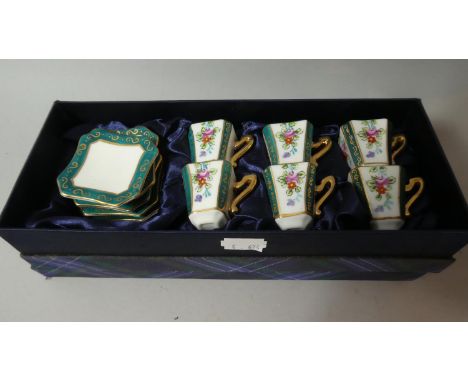 A Boxed Continental Miniature Ceramic Coffee Service 