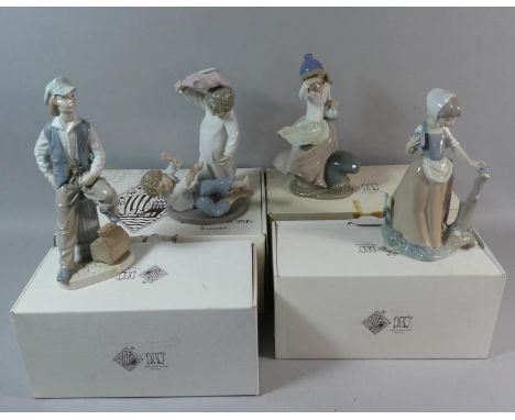 A Collection of Four Boxed Nao Figural Ornaments 