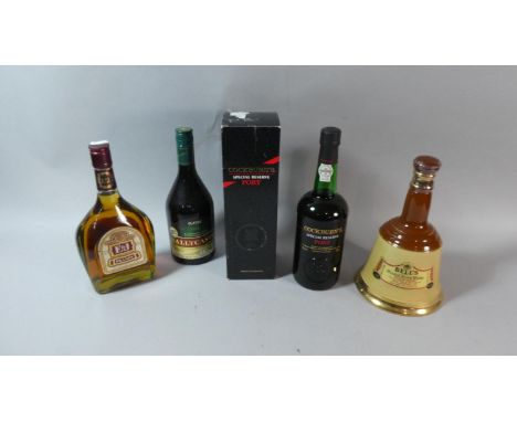 A Boxed Bottle of Cockburns Special Reserve Port, Wade Bells Whisky Decanter(Full), Bottle of Brandy and Ballycastle 