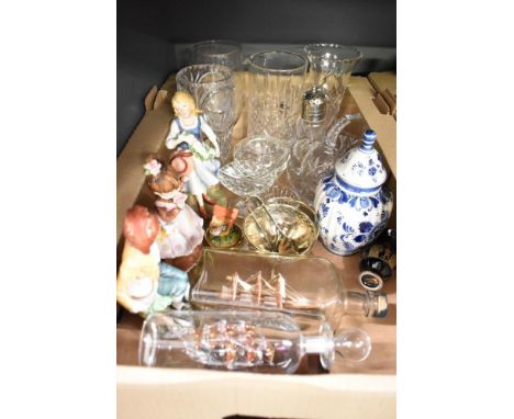 A small collection of glass ware including a cut glass water jug, a celery jar, vases and bowls, a Delft ware ginger jar, thr