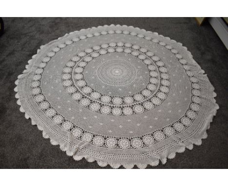 A circular cotton hand crocheted tablecloth 167cm diameter