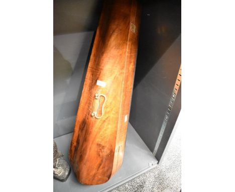 A Victorian brass mounted violin case, the hinged serpentine cover with applied brass carrying handle over brass lock plate a