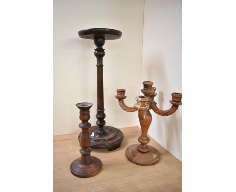 A 19th century mahogany jardinière stand on a turned base, h50cm, sold together with a 4 stem candelabra and a single candles