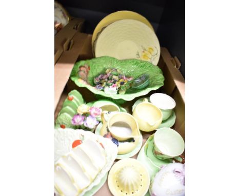 A selection of Carleton and Melba Ware including a foxglove cup and Lily tennis tray, a tomato leaf triangular dish and a sim