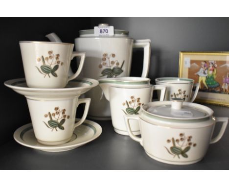A Royal Copenhagen tea service decorated with foliage and gilt edging on an ice white ground, makers mark to base, pattern 88
