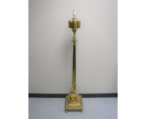 A brass column standard lamp 