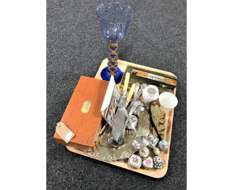 A tray of collectables including Villeroy & Boch blue glass candlestick, Limoges trinket pots, postcards, silver plated wares