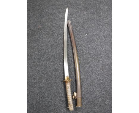 A Japanese WWII Type 95 NCO's shin gunto katana in scabbard with matching serial numbers 136429 CONDITION REPORT: Losses to p