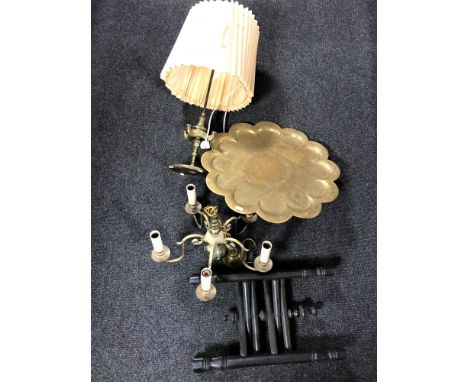A brass five branch chandelier, together with an engraved brass table lamp and a brass topped occasional table