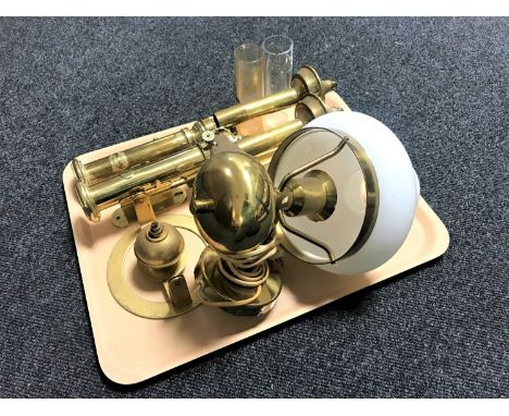 A tray of two pairs of continental brass wall mounted oil lamps, another oil lamp with swivel burner and a wall light