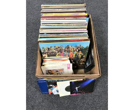 A box of LP's and 45's including The Beatles, Rolling Stones, Fleetwood Mac, Lindisfarne etc