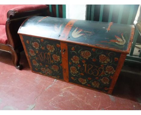 A nineteenth century hand painted dome topped shipping trunk 