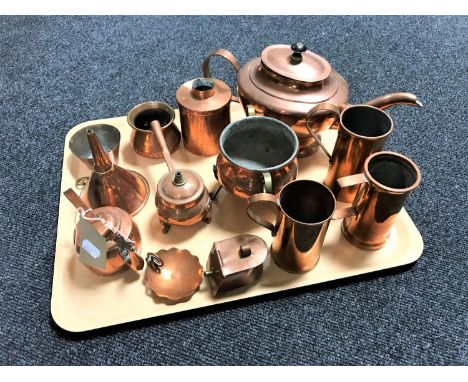 A tray of continental copper wares including teapot, cauldron, wine funnel, tankards etc