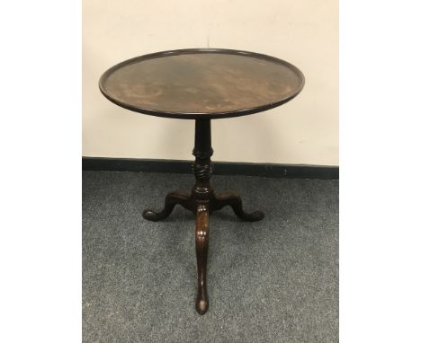 A nineteenth century mahogany circular tripod occasional table, diameter 56 cm