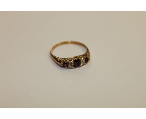 An antique ruby and diamond ring, size M, 2g.