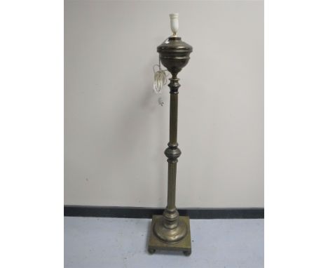 A brass Corinthian column standard lamp 