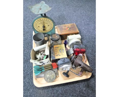A tray of Chinese puzzle box, set of vintage Weight Well scales, bike lights, fishing reels, darts, jar of coins etc 