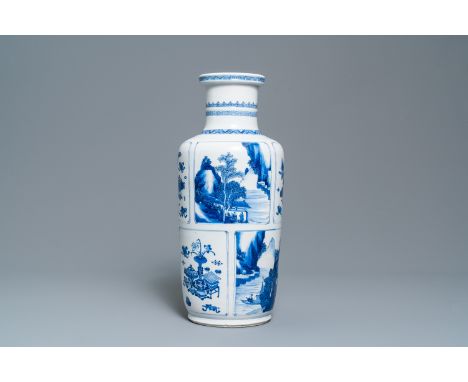A Chinese blue and white 'antiquities and landscapes' rouleau vase, KangxiH.: 45,5 cmÊ Condition: (UV-checked)- The neck with