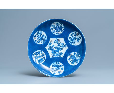 A Chinese blue, white and copper red powder blue-ground charger, KangxiDia.: 36 cm
