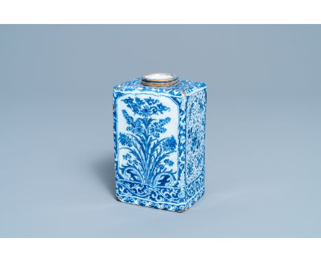 A rectangular Dutch Delft blue and white tea caddy with floral design, late 17th C.H.: 15 cmÊMarked AK above a numeral 90 on 