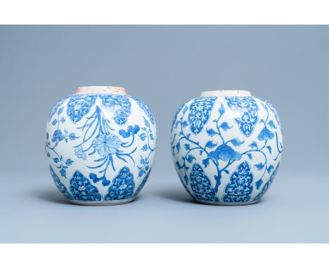 A pair of Chinese blue and white jars with floral design, KangxiH.: 21,5 cmÊ Provenance: Each with a label on the base for th