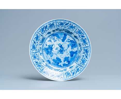 A Chinese blue and white 'Mongolian hunting' dish, KangxiDia.: 36,5 cm