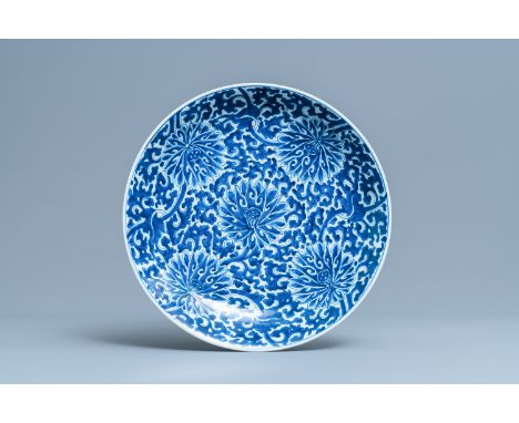 A Chinese blue and white 'lotus scroll' charger, KangxiDia.: 38,5 cm