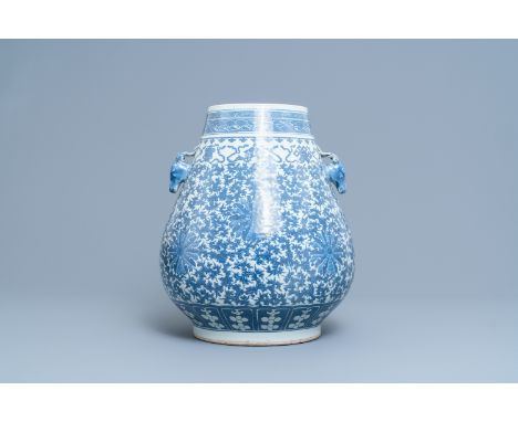 A Chinese blue and white 'hu' vase with lotus scrolls, 19th C.H.: 44,5 cmÊ Provenance: The collection of a French envoy in Ch