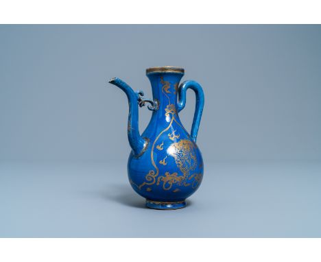 A Chinese gilt-decorated powder blue-ground jug with mythical beasts, KangxiH.: 17,5 cm - L.: 15 cm