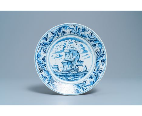 A Dutch Delftware blue and white dish with a large battle ship, Bolsward, Friesland, 18th C.Dia.: 34 cmÊ Attributed to the pa