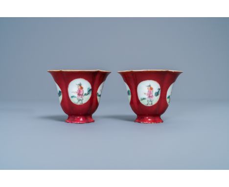 A pair of Chinese famille rose ruby-ground wine cups with foreigners, QianlongL.: 9,3 cm - H.: 7 cmÊ Provenance: The collecti