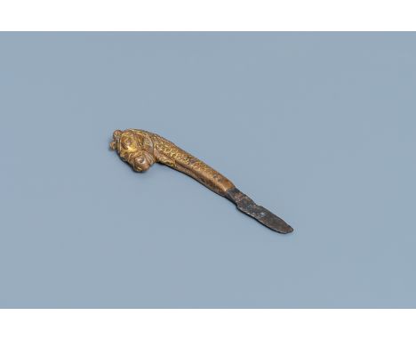A Sino-Tibetan gilt bronze knife handle in the shape of a horse, MingL.: 11 cmÊ Provenance: The collection of a French envoy 
