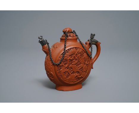 A Chinese silver-mounted reticulated double-walled Yixing stoneware teapot, KangxiL.: 14 cm - H.: 12,5 cm
