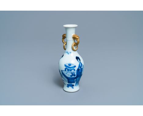 A Chinese blue and white vase with gilt elephant-head handles, KangxiH.: 17 cm