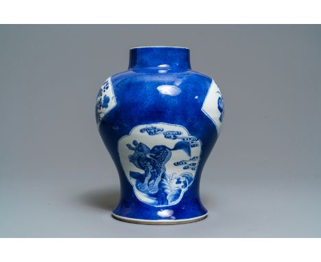 A Chinese blue and white powder blue-ground vase, KangxiH.: 33,5 cmÊ Condition: (UV-checked)- With a S-shaped hairline from j