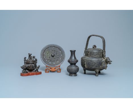 Two Chinese bronze censers, a vase and a mirror, Ming and laterL.: 24 cm - H.: 26,5 cm (the largest piece ) - Dia.: 18 cm (th