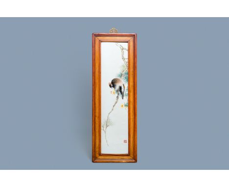 A large Chinese rectangular plaque with a bird on a blossoming branch, seal mark, RepublicDim.: 95 x 32,5 cm (the frame)Dim.: