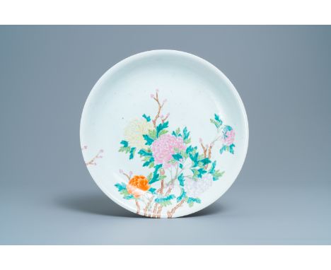 A Chinese famille rose 'peony' dish, RepublicDia.: 39,5 cmÊ The back decorated with a blue and white Kangxi-style landscape.