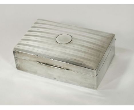 CIGARETTE BOX. A cigarette box with engine turned lid & vacant cartouche. 12.5 x 8cm.  Please note that all items in this auc