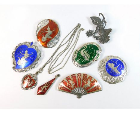 SIAM SILVER. A Siam silver dancing girl brooch, five Siam coloured enamel brooches & two pendant drops.  Please note that all