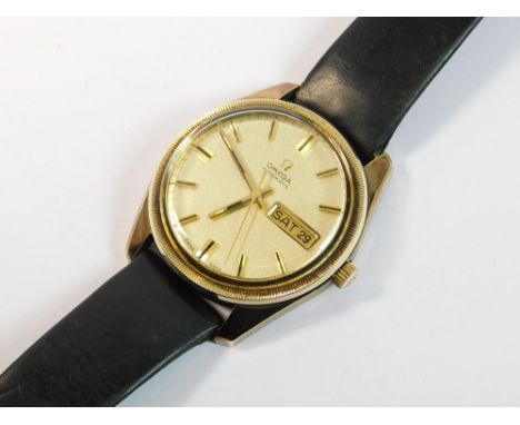 OMEGA AUTOMATIC. A gentleman's 1970's 9ct. gold Omega Automatic wristwatch. The gold dial with day/date aperture & sweep seco