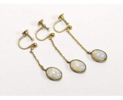 OPAL EARRINGS. Three opal earrings set in 9ct. gold & with 9ct. gold screw fittings.  Please note that all items in this auct