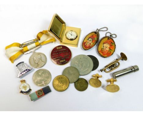 MISCELLANEOUS. Collectors' items including a brass trumpet pin, medals & coins, enamel badges, a travelling clock etc.  Pleas