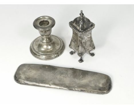 PEPPER ETC. An Edwardian pepper, Sheffield 1902. Also, a low candlestick & a scrap silver mount from a brush.  Please note th