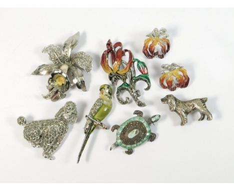 MARCASITE ETC. A marcasite & coloured enamel flower brooch, with matching stud earrings. Four other various marcasite brooche