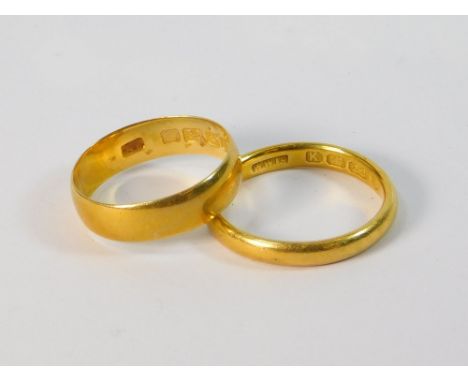 GOLD RINGS. Two 22ct. gold wedding bands. Gross weight approx. 6.5g. Sizes, broad band K, narrow band M/N.  Please note that 
