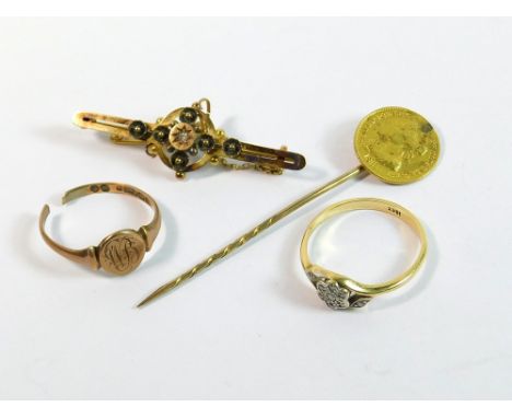 GOLD RING ETC. An 18ct. gold diamond flowerhead ring. Size R. Also, a 15ct. gold Victorian bar brooch, a coin stick pin & a 9