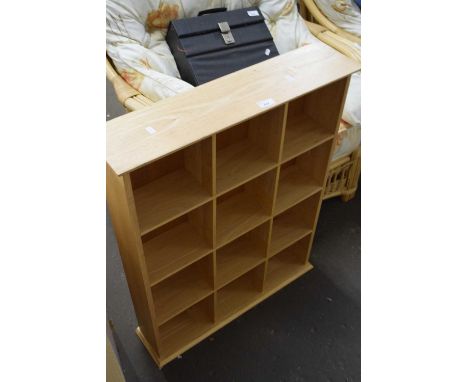 A modern light wood shelf unit