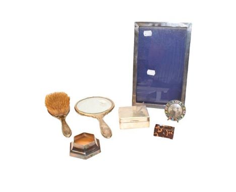 Six Victorian and later silver photograph frames of varying size and design, together with a small silver cigarette box, Eliz
